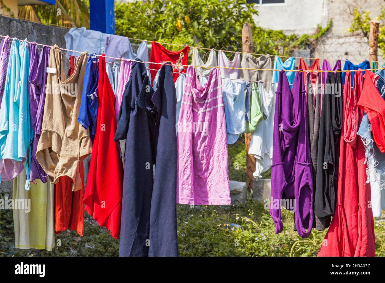 Laundry. Clothing hanging out to dry on a line Stock Photo - Alamy