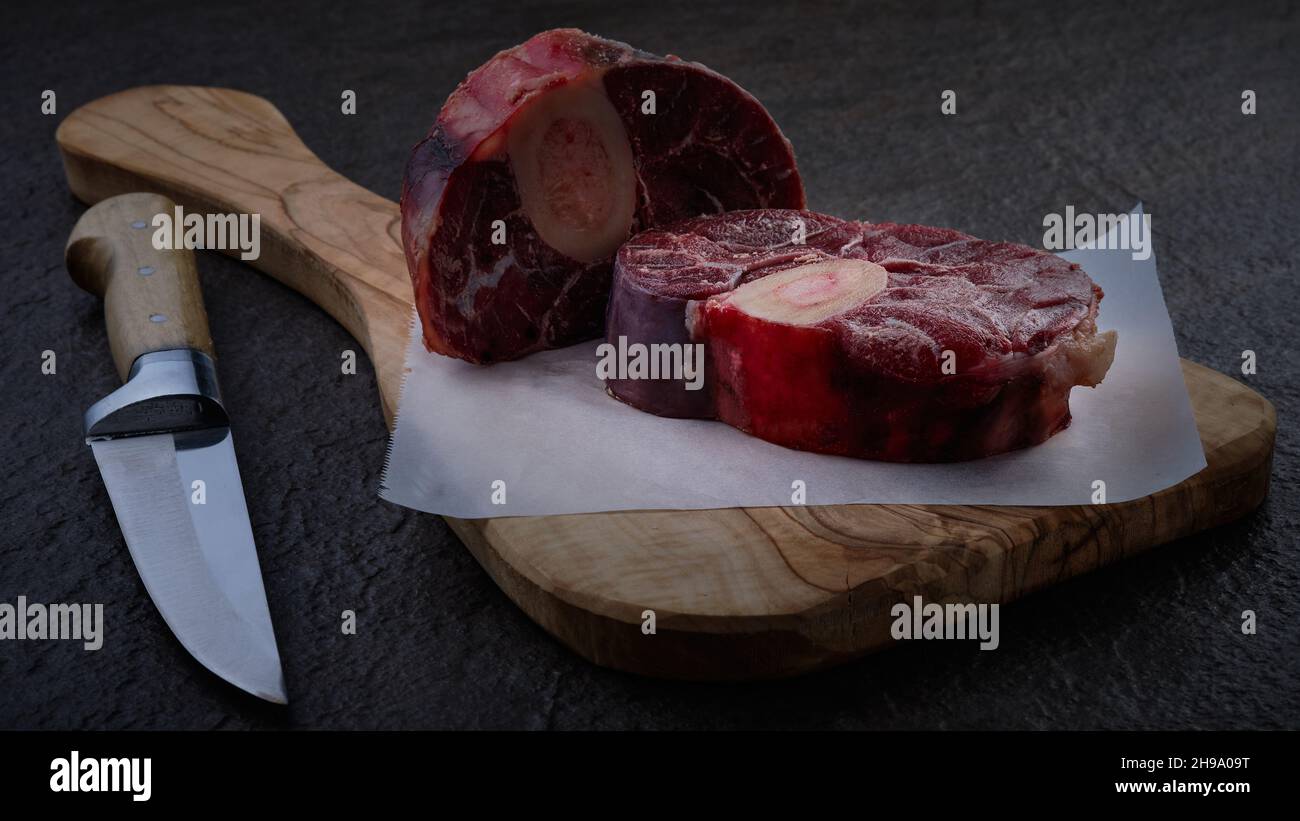 Raw veal shanks on cutting board Stock Photo