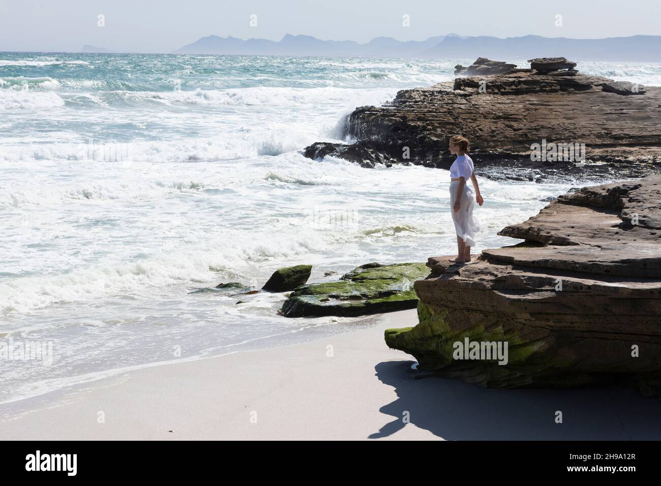 Teenage girl exploring Walker Bay Nature Reserve, Western Cape, South Africa. Stock Photo