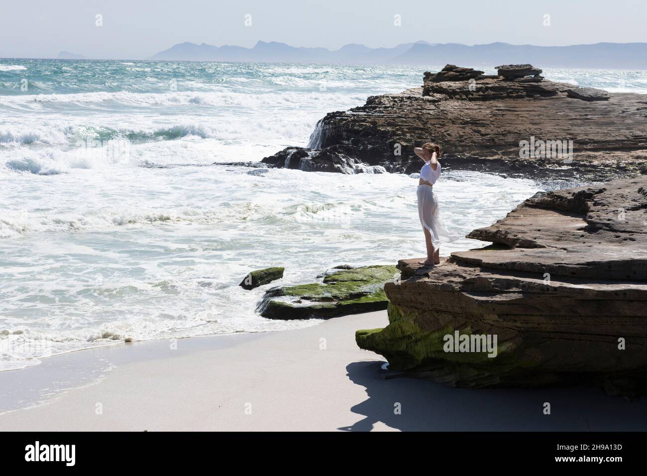 Teenage girl exploring Walker Bay Nature Reserve, Western Cape, South Africa. Stock Photo