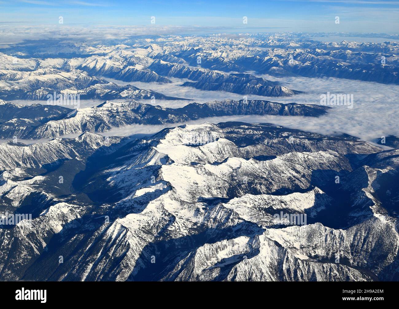 Aerial View of Snow covered mountains. Stock Photo
