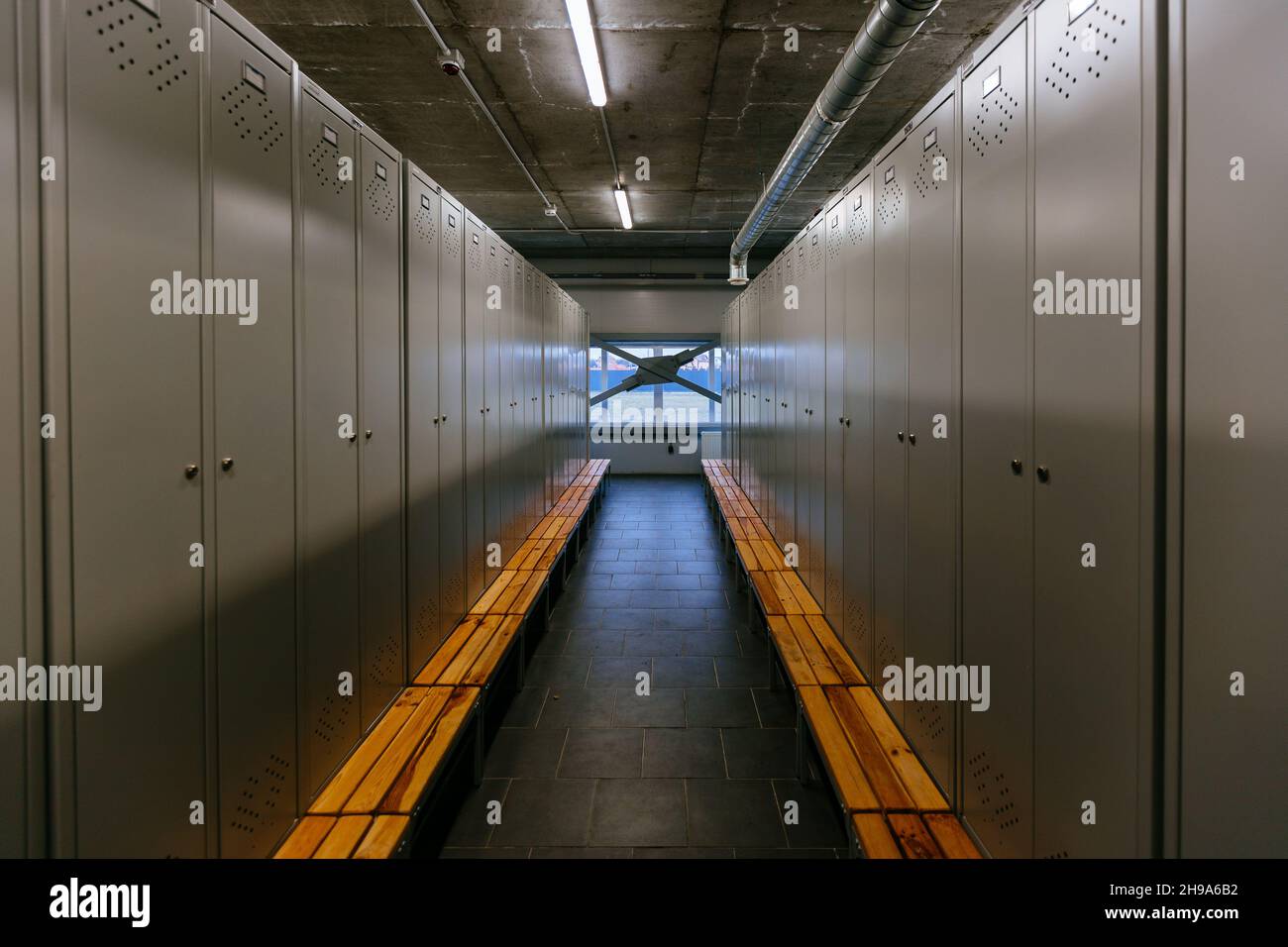 Metal lockers in the cloakroom for workers of the factory. Stock Photo