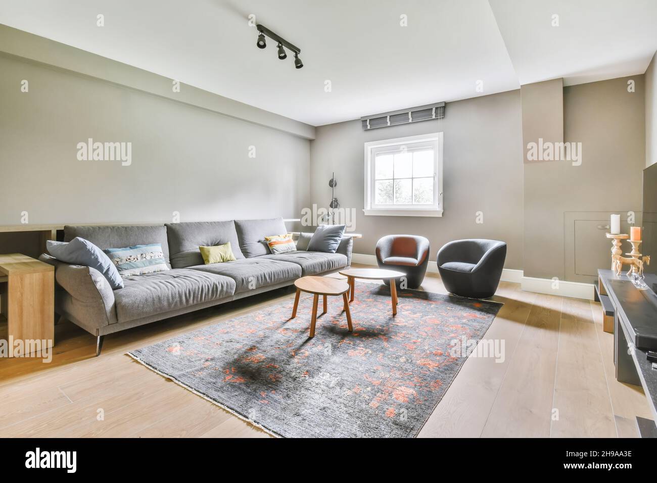 Stunning living room with plush comfy and plush sofas Stock Photo