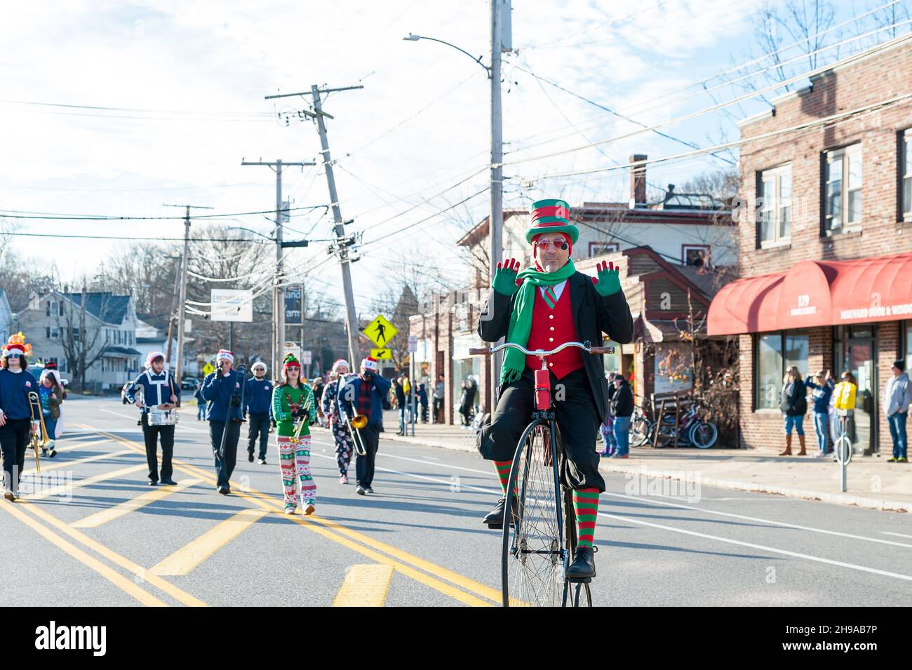 Man riding a unicycle in the Christmas and Holiday Parade in Maynard