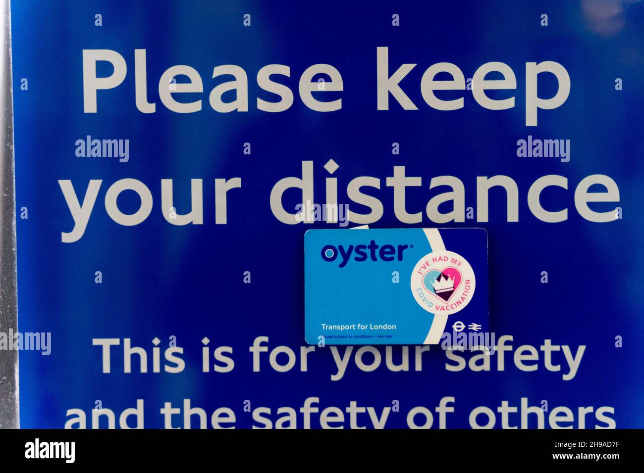 public health notice Please keep your distance on DLR train, with a