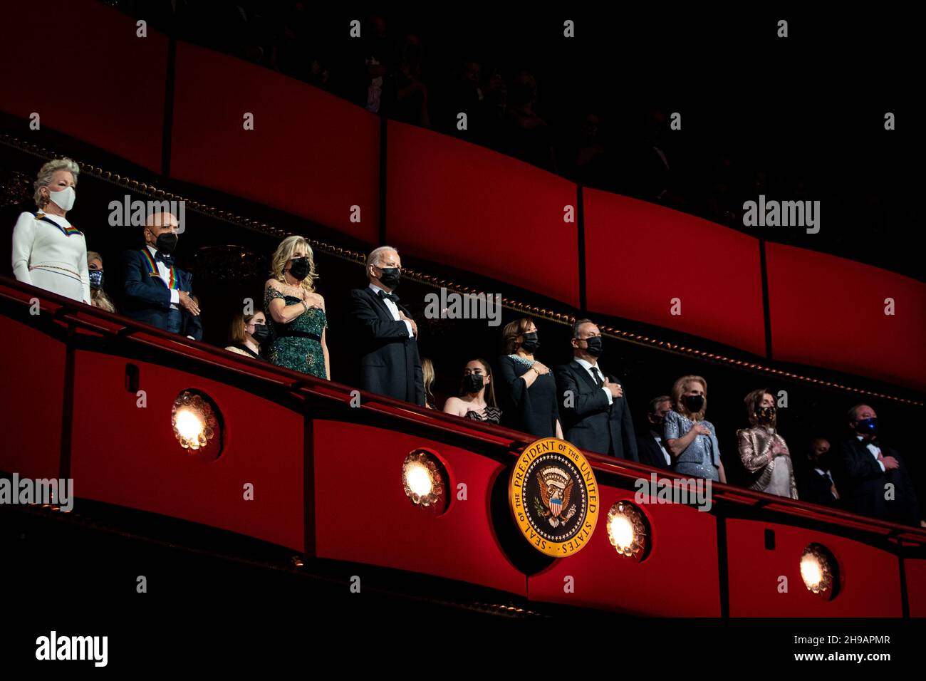 U.S. President Joe Biden, U.S. First Lady Jill Biden, U.S. Vice President Kamala Harris, and Second Gentleman Douglas Emhoff stand for the National Anthem during the 44th Kennedy Center Honors at the John F. Kennedy Center for the Performing Arts in Washington, DC, U.S., on Sunday, Dec. 5, 2021. The 44th Honorees for lifetime artistic achievements include operatic bass-baritone Justino Diaz, Motown founder Berry Gordy, Saturday Night Live creator Lorne Michaels, actress Bette Midler, and singer-songwriter Joni Mitchell. Photographer: Al Drago/Pool/Sipa USA Stock Photo