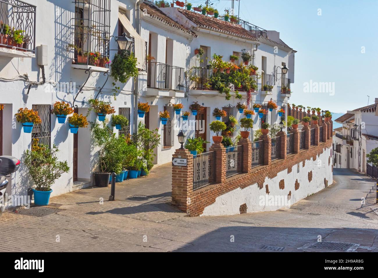 White houses decorated with flower pots, Mijas, Malaga Province, Andalusia Autonomous Community, Spain Stock Photo