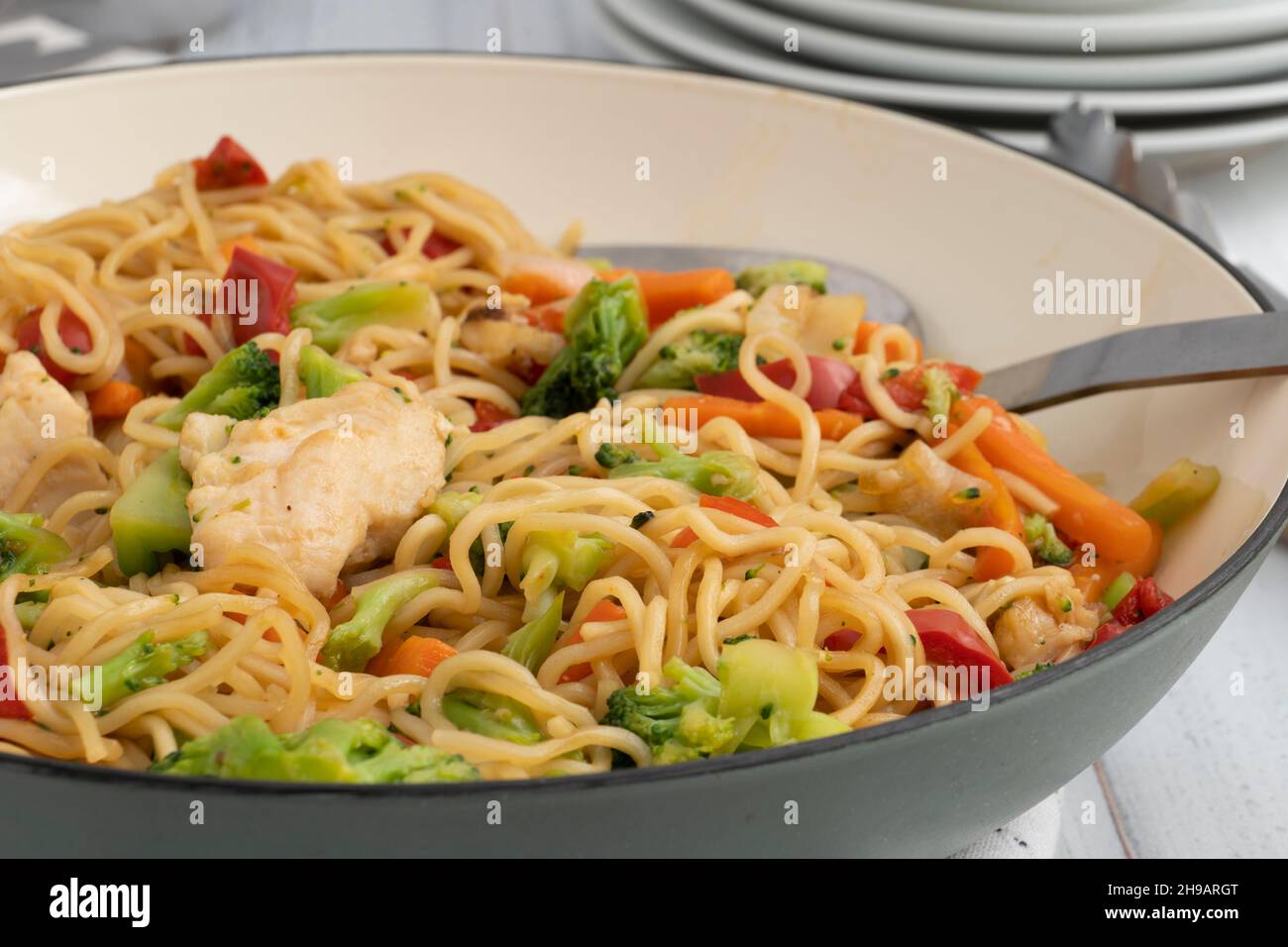 Close up of homemade chicken chow mein in a skillet Stock Photo