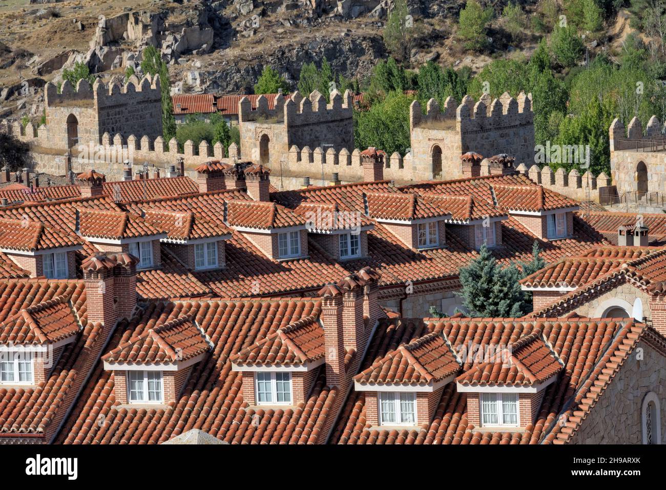 Old houses with red roof within the medieval town walls of Avila (UNESCO World Heritage site), Avila Province, Castile and Leon Autonomous Community, Stock Photo