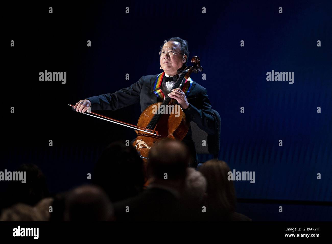 Washington, United States. 05th Dec, 2021. Cellist Yo-Yo Ma performs the National Anthem during the the 44th Kennedy Center Honors at the John F. Kennedy Center in Washington, DC on Sunday, December. 5, 2021. The John F. Kennedy Center for the Performing Arts 44th Honorees for lifetime artistic achievements include operatic bass-baritone Justino Diaz, Motown founder Berry Gordy, Saturday Night Live creator Lorne Michaels, actress Bette Midler, and singer-songwriter Joni Mitchell. Photo by Al Drago/UPI Credit: UPI/Alamy Live News Stock Photo