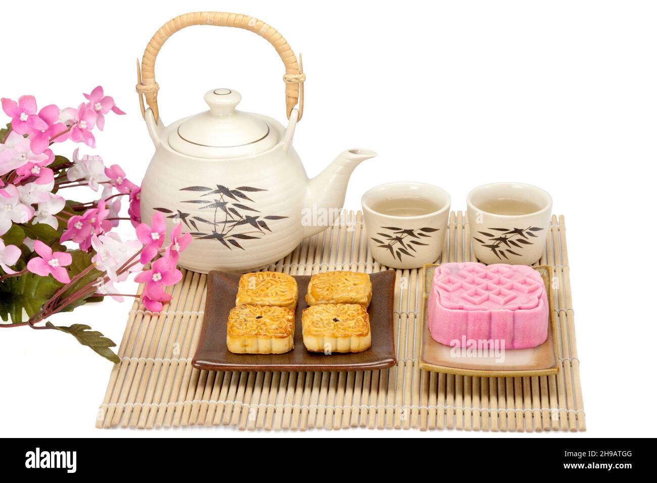 Moon cake two size with tea Stock Photo