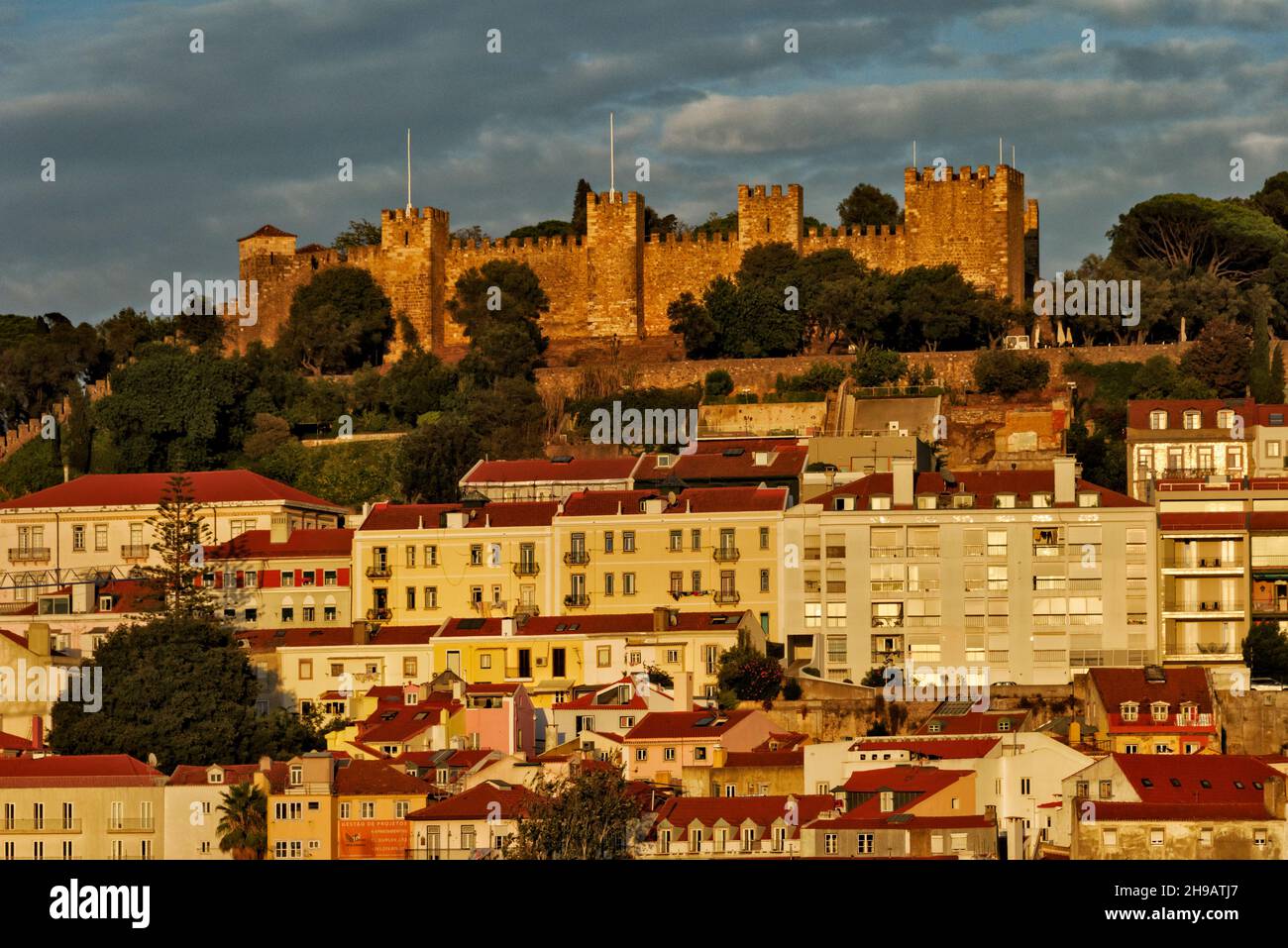 Sao Jorge Castle above red roof houses, Lisbon, Portugal Stock Photo ...