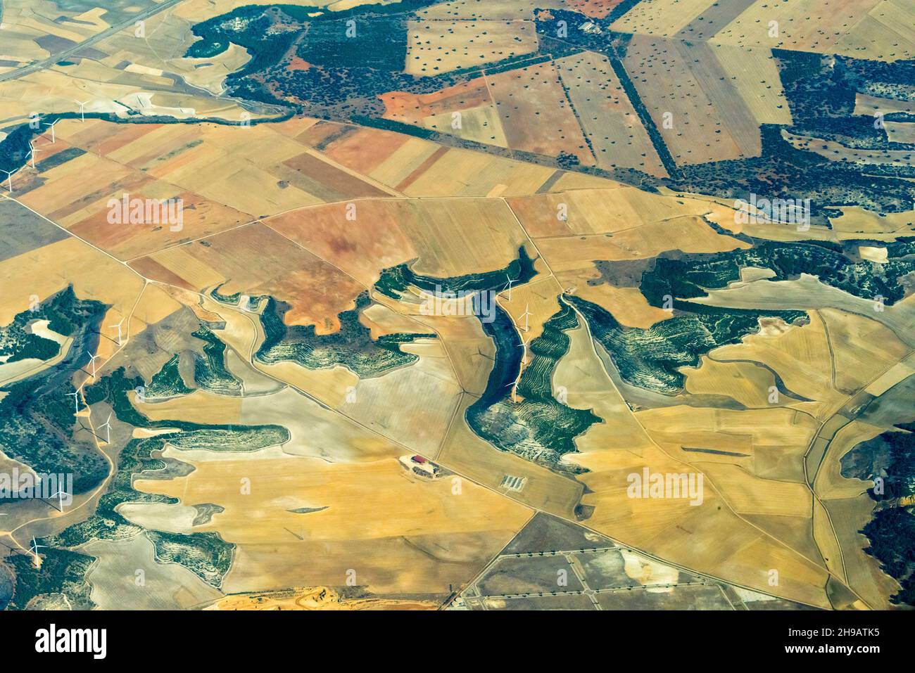 Aerial view of wind turbines on farmland, northern Spain Stock Photo