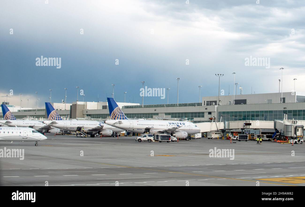 Aurora Colorado USA June 10 2021; Rows of planes are delayed at this airport, as storms move in and flights are canceled or slowed down Stock Photo