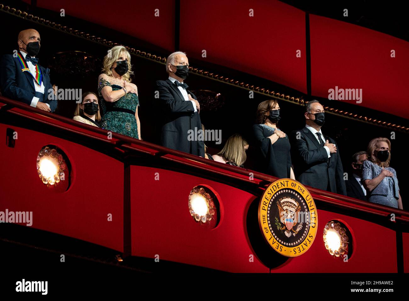 U.S. President Joe Biden, U.S. First Lady Jill Biden, U.S. Vice President Kamala Harris, and Second Gentleman Douglas Emhoff stand for the National Anthem during the 44th Kennedy Center Honors at the John F. Kennedy Center for the Performing Arts in Washington, DC, U.S., on Sunday, Dec. 5, 2021. The 44th Honorees for lifetime artistic achievements include operatic bass-baritone Justino Diaz, Motown founder Berry Gordy, Saturday Night Live creator Lorne Michaels, actress Bette Midler, and singer-songwriter Joni Mitchell. Photographer: Al Drago/BloombergCredit: Al Drago/Pool via CNP /MediaPu Stock Photo