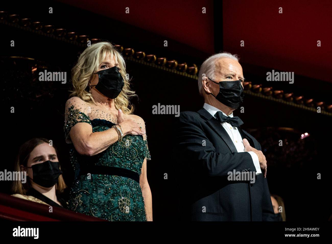 U.S. President Joe Biden and U.S. First Lady Jill Biden, stand for the National Anthem during the 44th Kennedy Center Honors at the John F. Kennedy Center for the Performing Arts in Washington, DC, U.S., on Sunday, Dec. 5, 2021. The 44th Honorees for lifetime artistic achievements include operatic bass-baritone Justino Diaz, Motown founder Berry Gordy, Saturday Night Live creator Lorne Michaels, actress Bette Midler, and singer-songwriter Joni Mitchell. Credit: Al Drago/Pool via CNP /MediaPunch Stock Photo