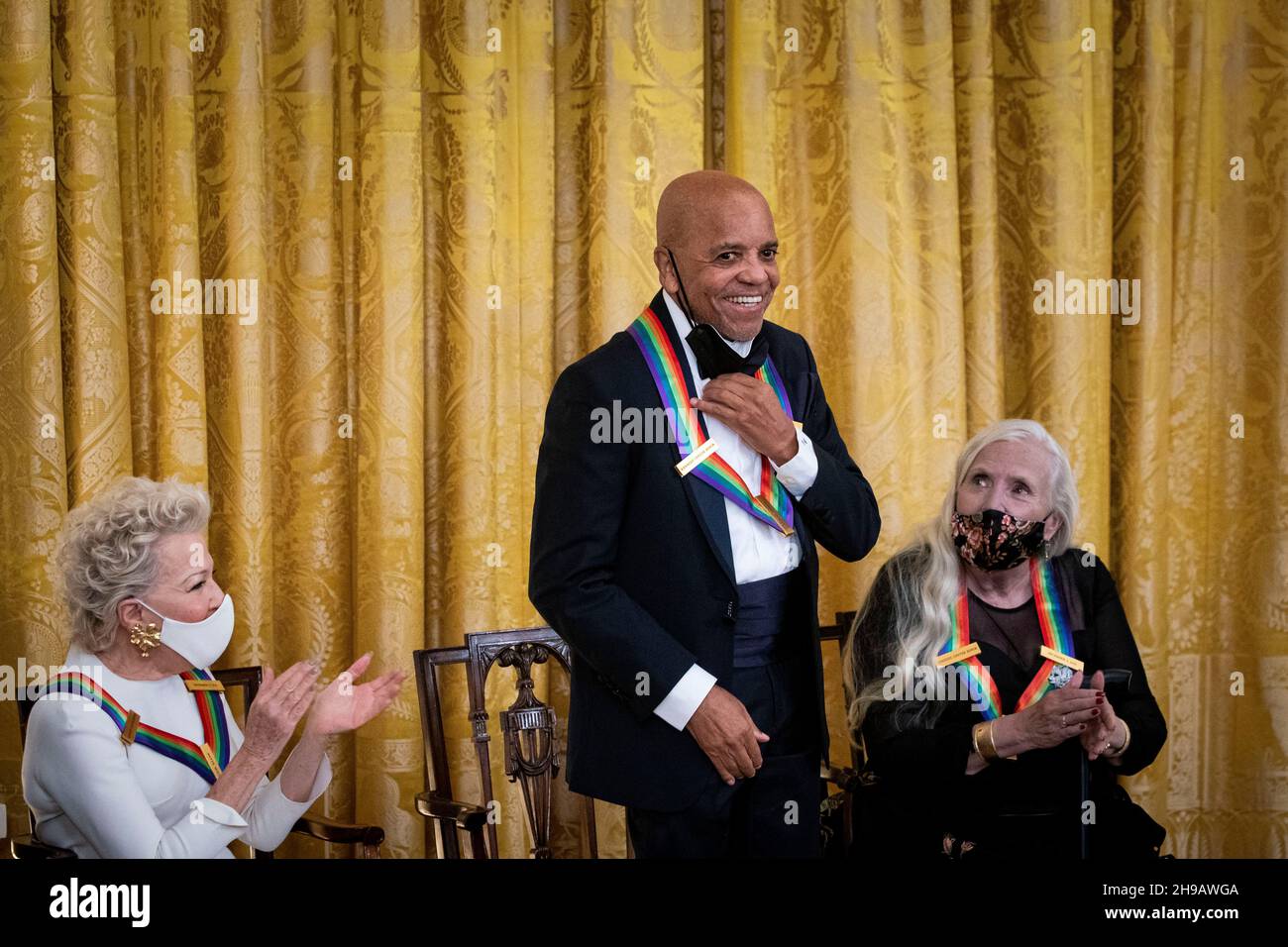 Washington, DC, U.S., on Sunday, Dec. 5, 2021. Berry Gordy, Motown founder, is recognized by U.S. President Joe Biden, not pictured, during the the Kennedy Center Honorees Reception in the East Room of the White House in Washington, DC, U.S., on Sunday, Dec. 5, 2021. The John F. Kennedy Center for the Performing Arts 44th Honorees for lifetime artistic achievements include operatic bass-baritone Justino Diaz, Motown founder Berry Gordy, Saturday Night Live creator Lorne Michaels, actress Bette Midler, and singer-songwriter Joni Mitchell. Credit: Al Drago/Pool via CNP /MediaPunch Stock Photo