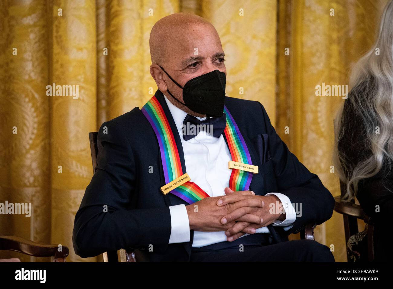 Washington, DC, U.S., on Sunday, Dec. 5, 2021. Berry Gordy, Motown founder, listens as U.S. President Joe Biden, not pictured, speaks during the Kennedy Center Honorees Reception in the East Room of the White House in Washington, DC, U.S., on Sunday, Dec. 5, 2021. The John F. Kennedy Center for the Performing Arts 44th Honorees for lifetime artistic achievements include operatic bass-baritone Justino Diaz, Motown founder Berry Gordy, Saturday Night Live creator Lorne Michaels, actress Bette Midler, and singer-songwriter Joni Mitchell. Credit: Al Drago/Pool via CNP /MediaPunch Stock Photo