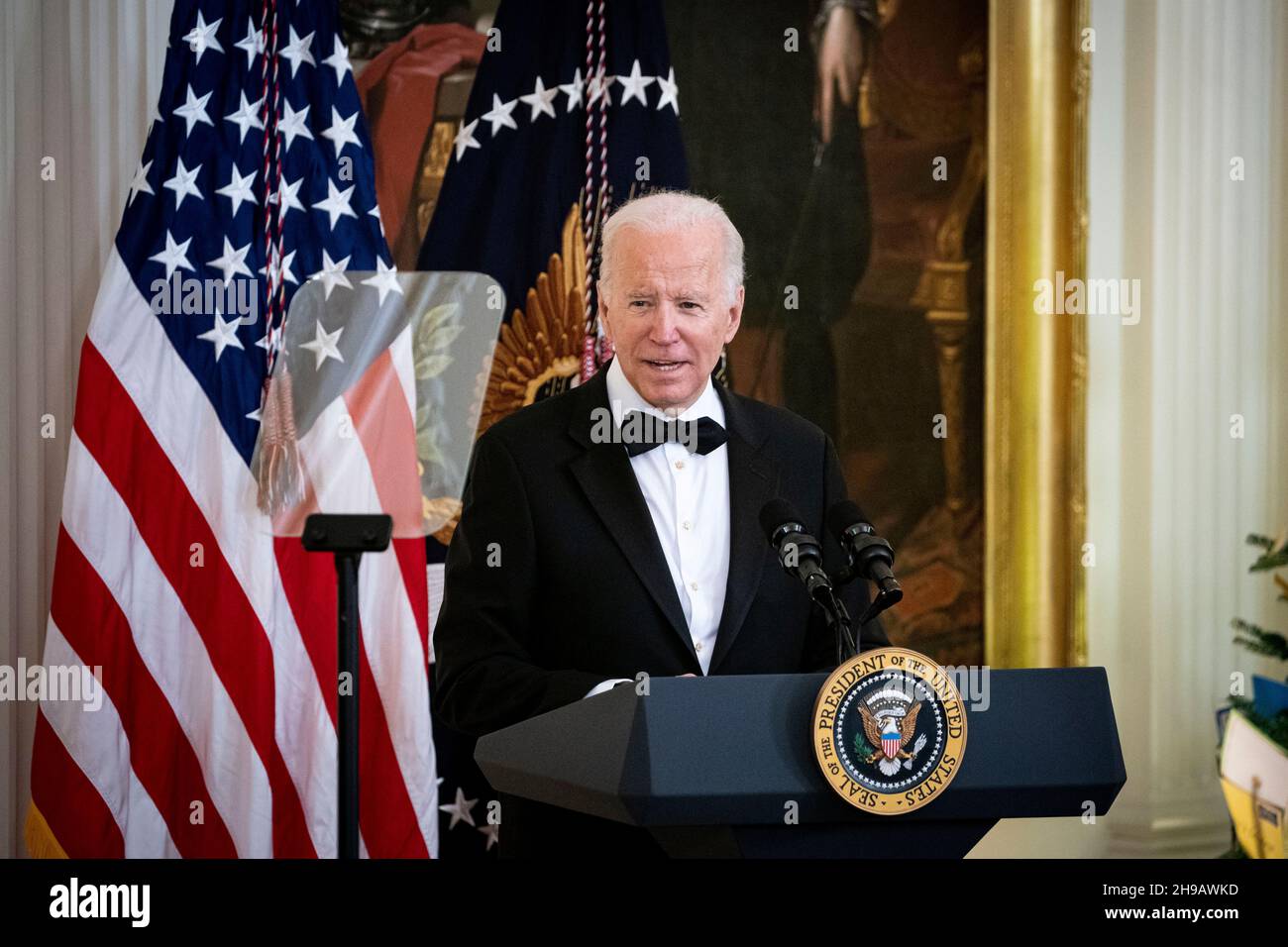Washington, DC, U.S., on Sunday, Dec. 5, 2021. U.S. President Joe Biden speaks during the Kennedy Center Honorees Reception in the East Room of the White House in Washington, DC, U.S., on Sunday, Dec. 5, 2021. The John F. Kennedy Center for the Performing Arts 44th Honorees for lifetime artistic achievements include operatic bass-baritone Justino Diaz, Motown founder Berry Gordy, Saturday Night Live creator Lorne Michaels, actress Bette Midler, and singer-songwriter Joni Mitchell. Credit: Al Drago/Pool via CNP /MediaPunch Stock Photo