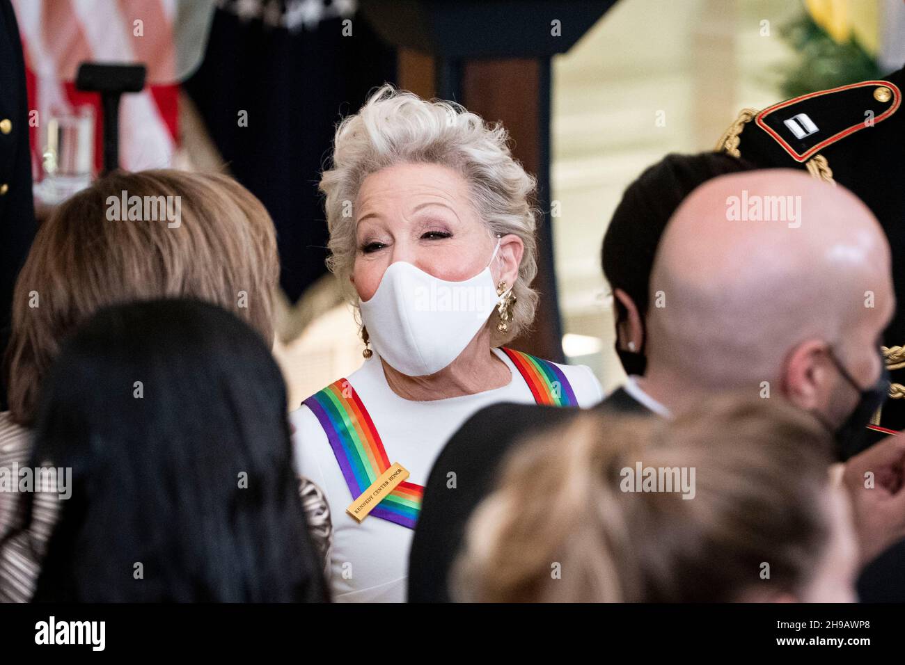 Washington, DC, U.S., on Sunday, Dec. 5, 2021. Actress Bette Midler departs during the Kennedy Center Honorees Reception in the East Room of the White House in Washington, DC, U.S., on Sunday, Dec. 5, 2021. The John F. Kennedy Center for the Performing Arts 44th Honorees for lifetime artistic achievements include operatic bass-baritone Justino Diaz, Motown founder Berry Gordy, Saturday Night Live creator Lorne Michaels, actress Bette Midler, and singer-songwriter Joni Mitchell. Credit: Al Drago/Pool via CNP /MediaPunch Stock Photo