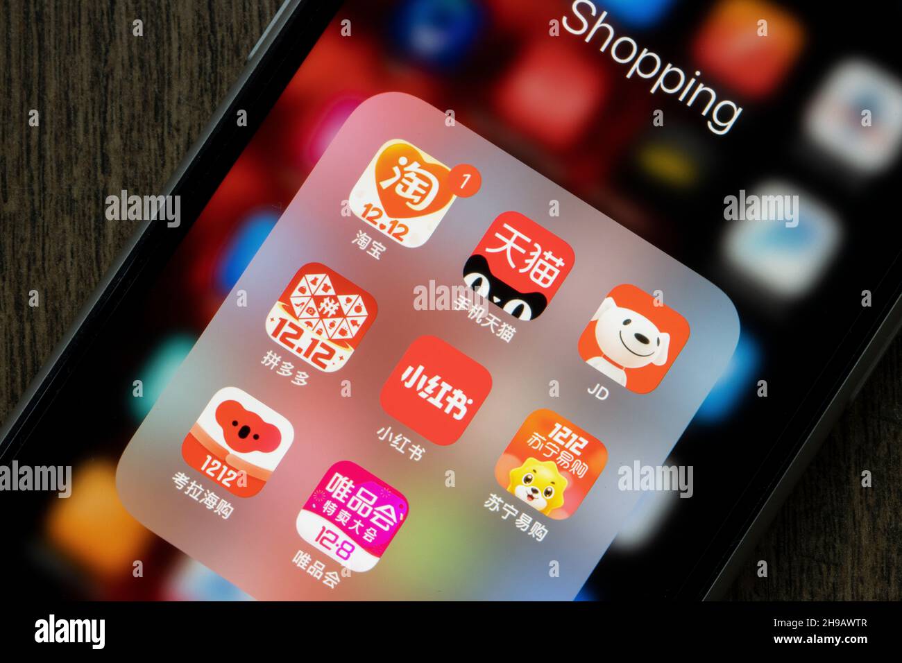 Chinese ecommerce apps (Taobao, Tmall, JD, Pingduoduo, Red, Suning, Kaola, VIP) with Double 12 ads are seen on an iPhone on Saturday, December 4, 2021. Stock Photo