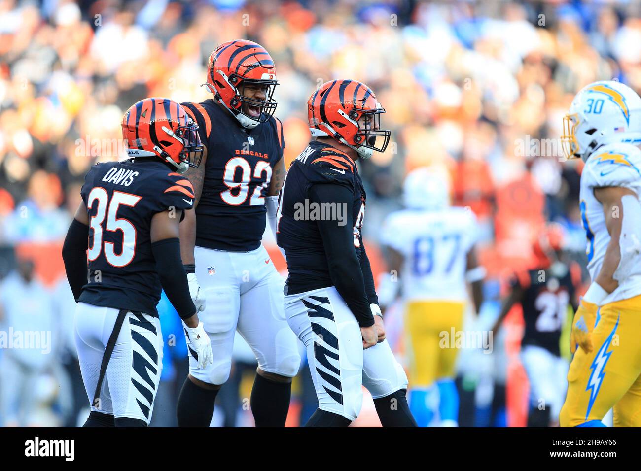 Cincinnati, Ohio, USA. 5th Dec, 2021. Cincinnati Bengals defensive end Trey  Hendrickson (91)celebrates with teammates after his sack for loss at the  NFL football game between the Los Angeles Chargers and the