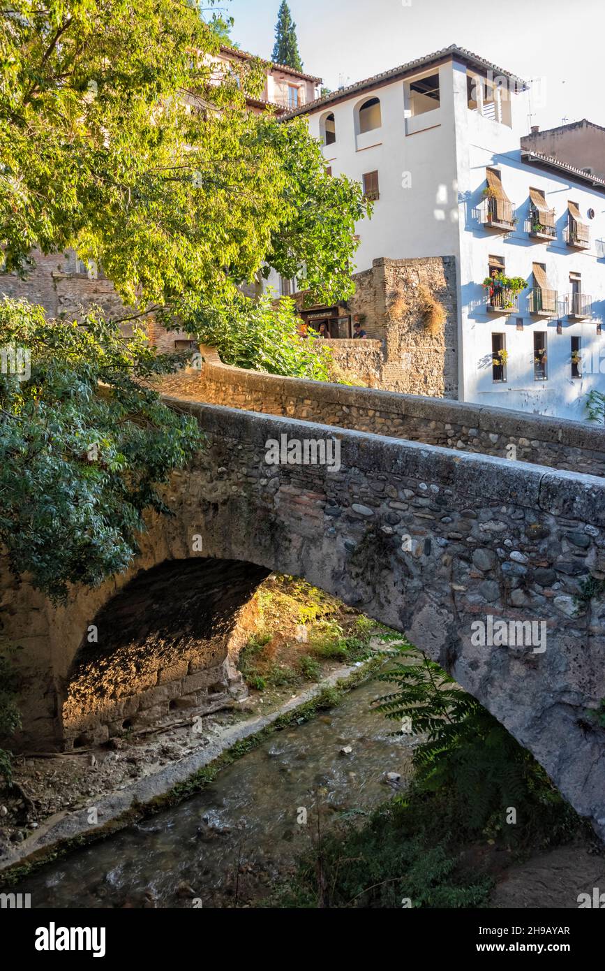 Stone bridge Aljibillo on Darro River, Granada, Granada Province, Andalusia Autonomous Community, Spain Stock Photo