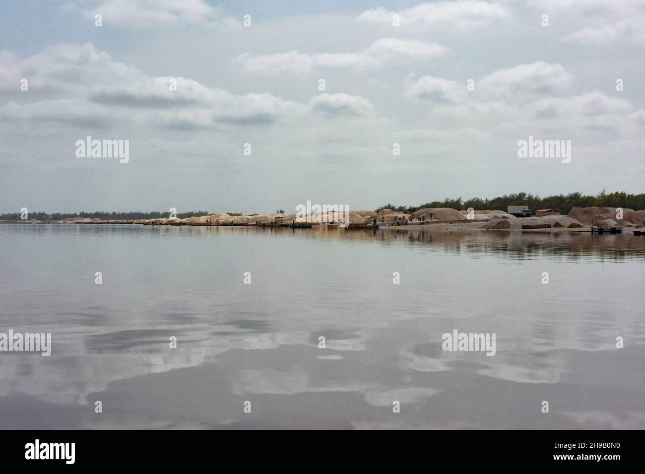 Harvested salt mounds on Lake Retba (Pink Lake), UNESCO World Heritage site, Cap Vert peninsula, Senegal Stock Photo