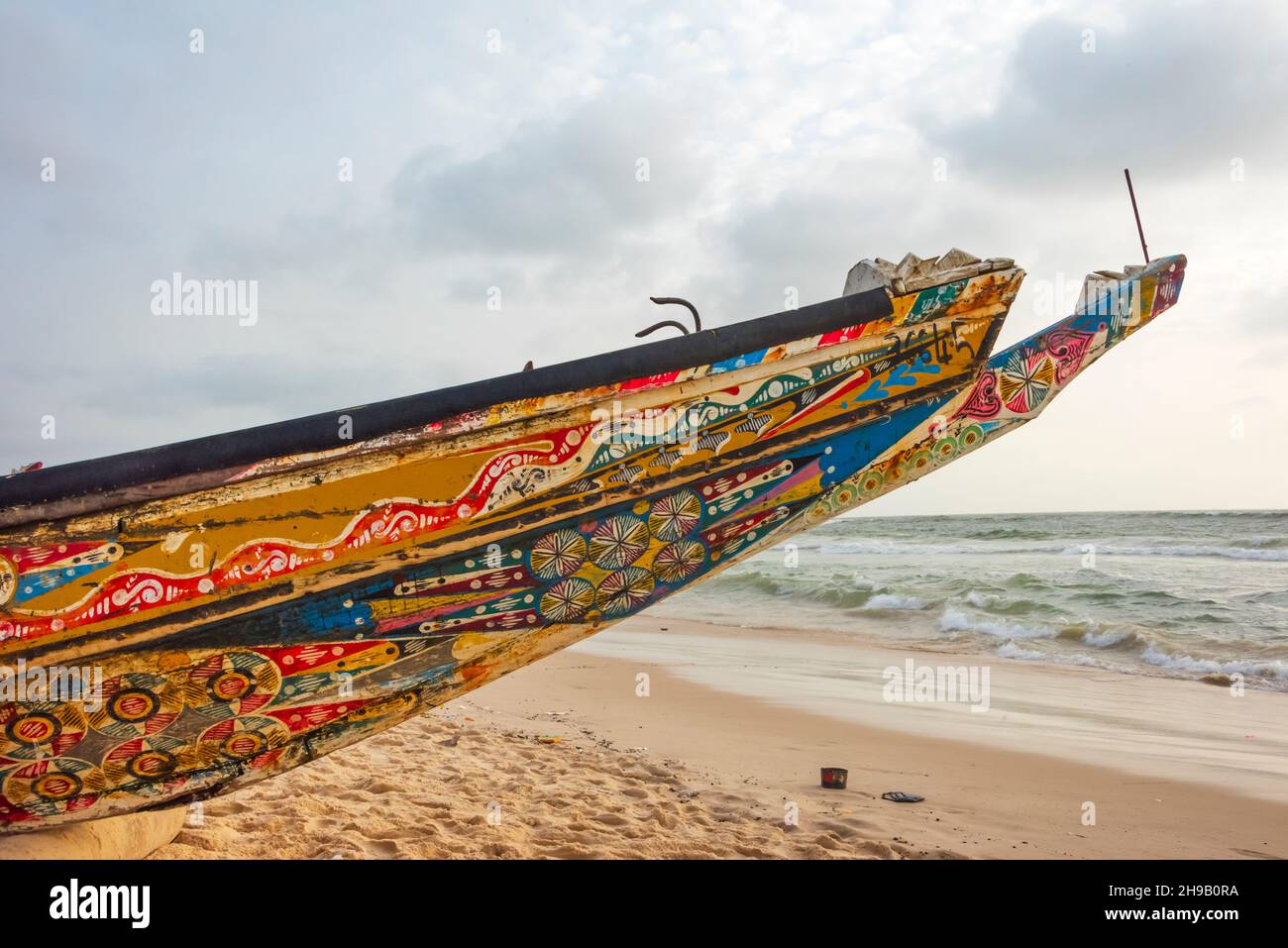 Fishing boats on the shore of Senegal River, Saint-Louis, Senegal Stock Photo