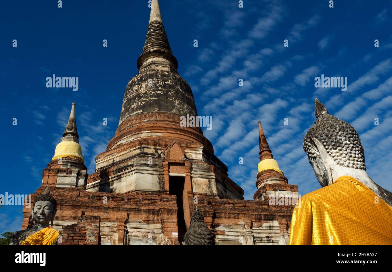 Buddha statue in front of the central stupa, Wat Yai Chai Mongkhon, Thailand, Asia Stock Photo