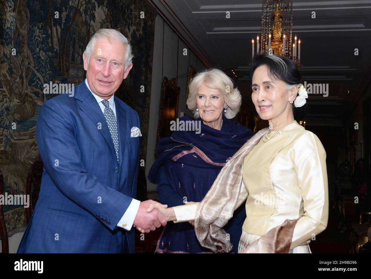 File photo dated 5/5/2017 of the Prince of Wales and the Duchess of Cornwall greet Burma's then de facto leader Aung San Suu Kyi (right) ahead of their meeting at Clarence House in London. A court in Myanmar has sentenced the country's ousted leader, Aung San Suu Kyi, to four years in prison after finding her guilty of incitement and violating coronavirus restrictions, a legal official said. Issue date: Monday December 6, 2021. Stock Photo