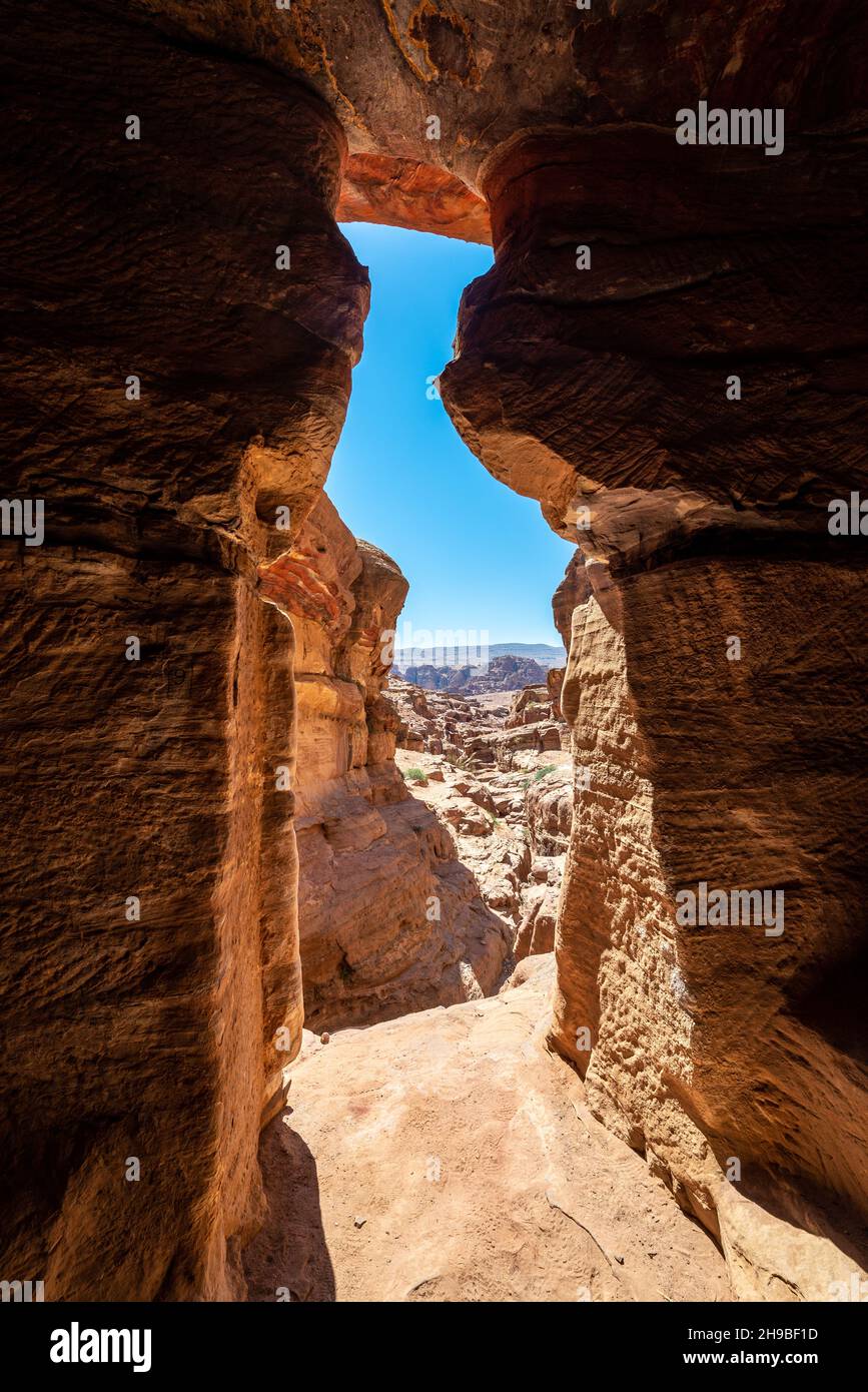 View looking out from inside the Lion Triclinium in Petra, Jordan Stock Photo