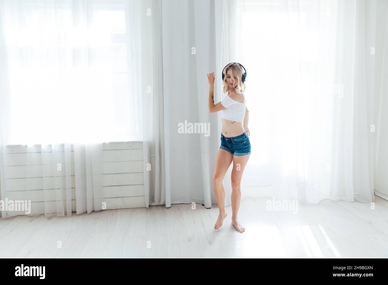Young boho woman dancing hi-res stock photography and images - Alamy