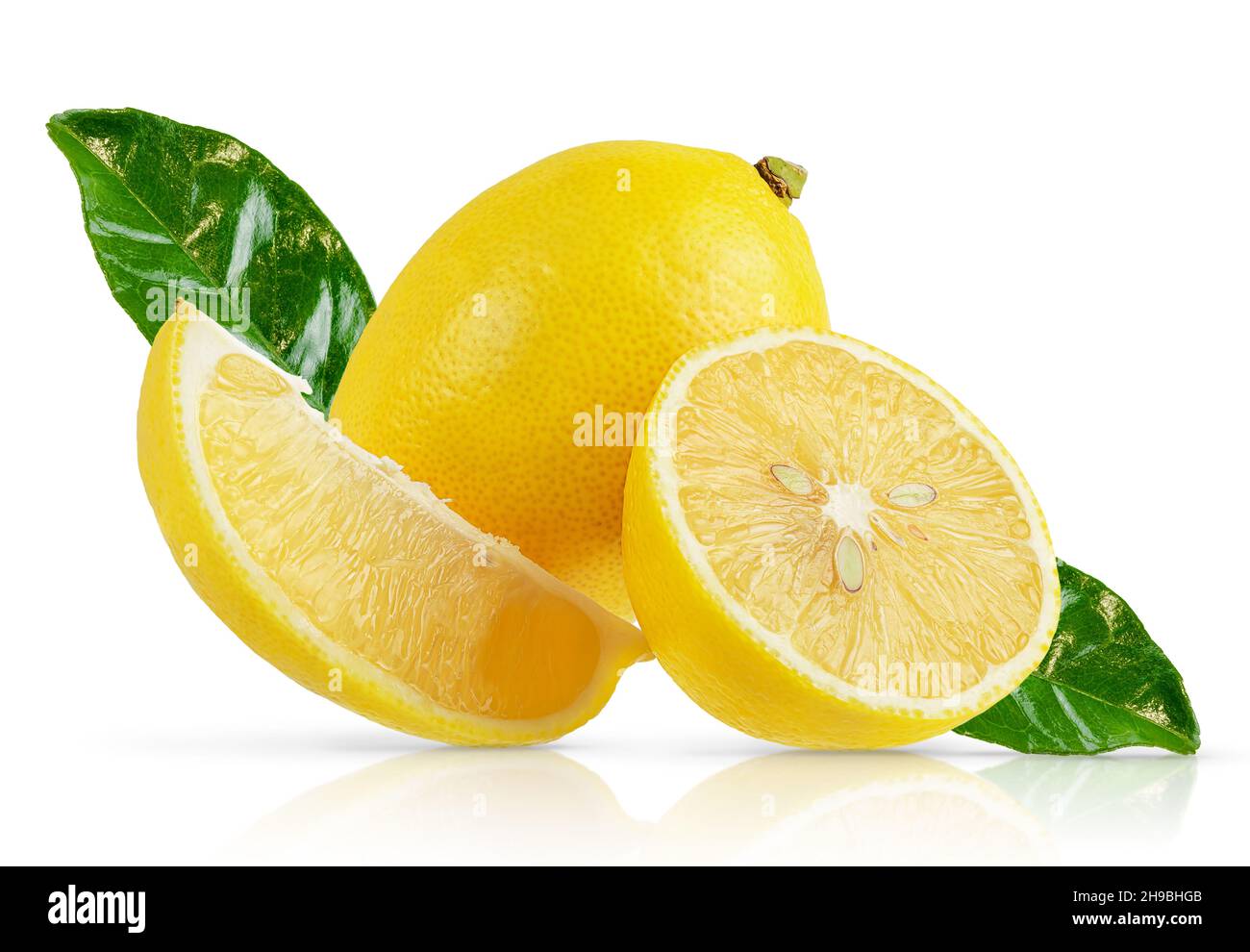 Composition of lemons with green leaves isolated with clipping path. Stock Photo