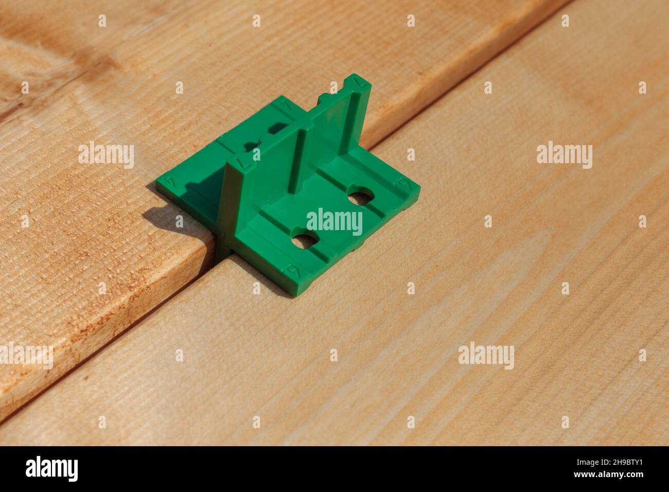 Terrace construction, use of bottom spacers. Deck board gap walks