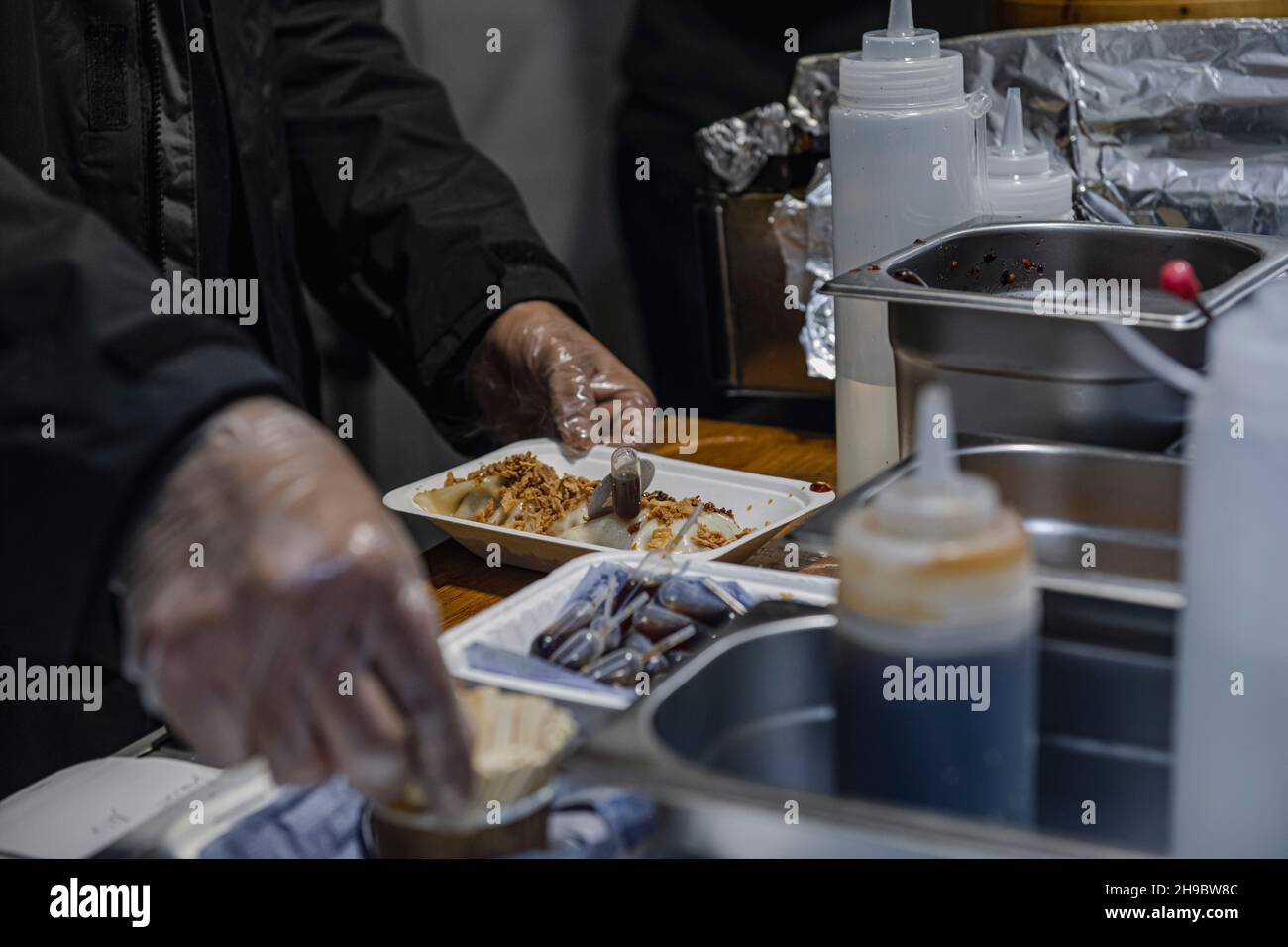 A streetfood stall Gyoza Guys by Amir Pem at Maltby Street Market in London on a Saturday morning Stock Photo