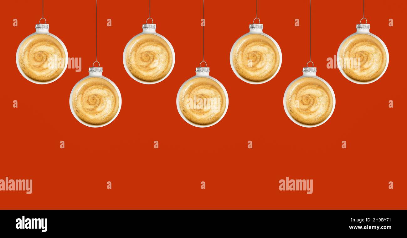 Christmas coffee concept with baubles on red background. Stock Photo