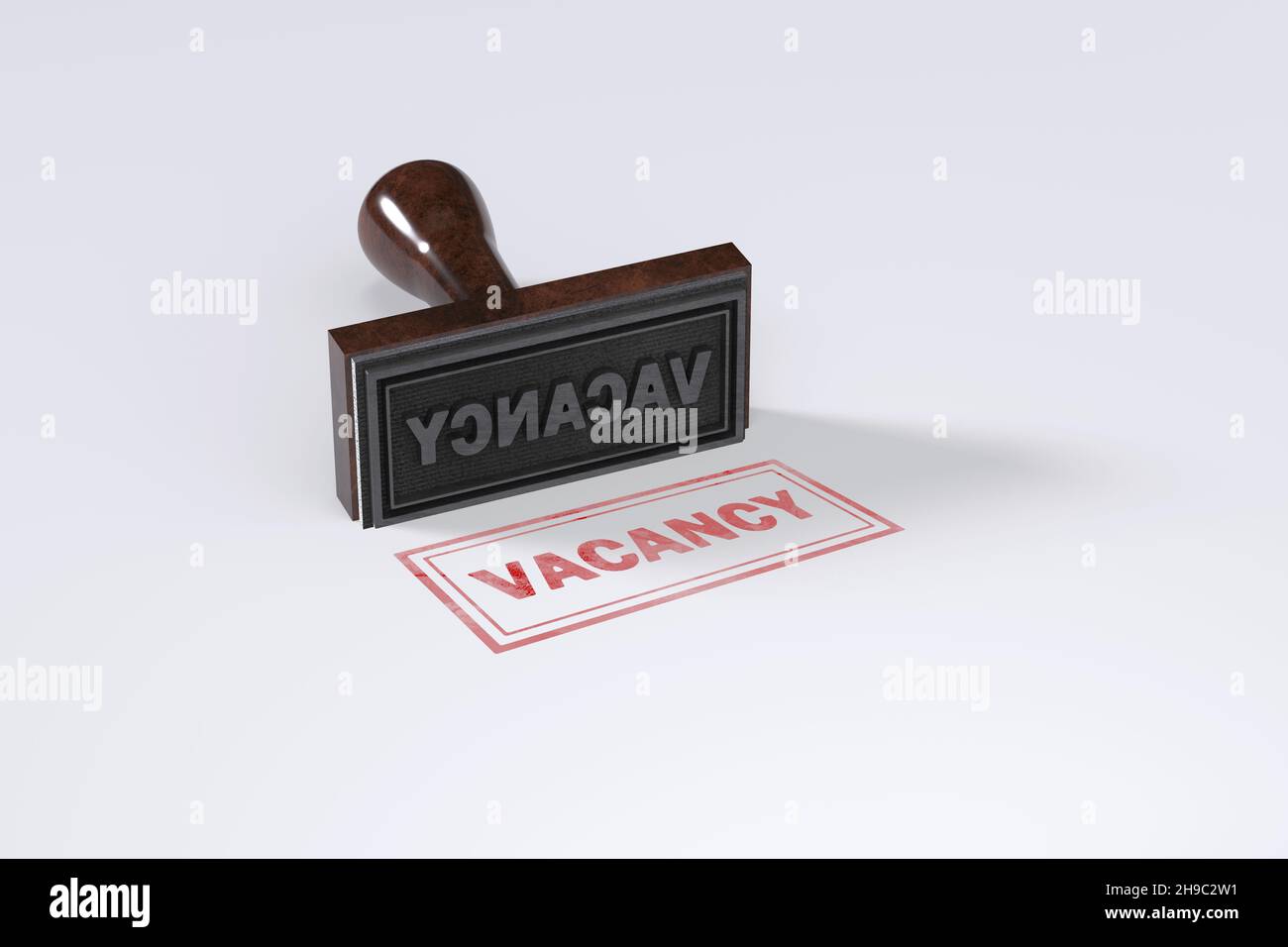 Rubber stamping that says Vacancy on White Background. Stock Photo