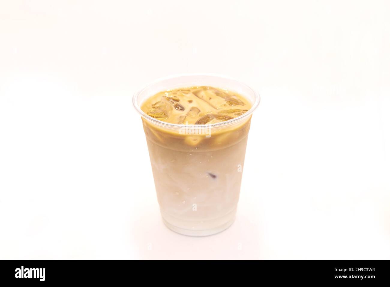 Vanilla iced latte served in a plastic to go cup Stock Photo - Alamy