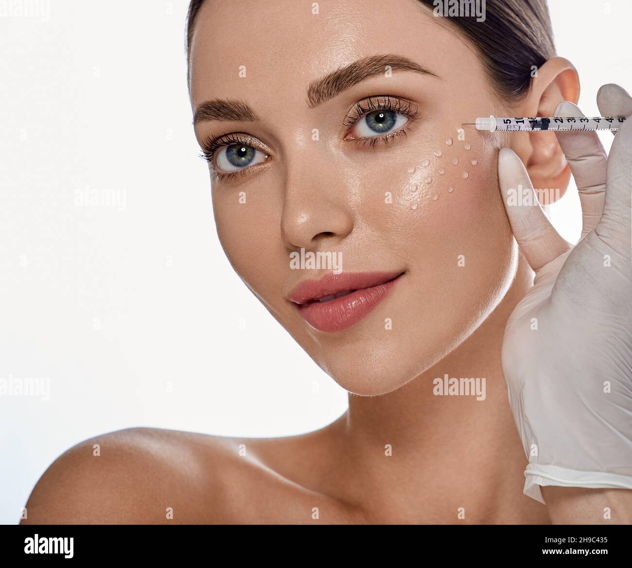 Biorevitalization, antiaging procedure. Beautiful woman getting beauty