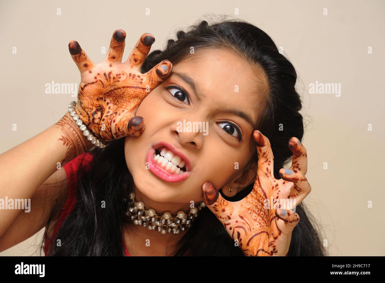 Indian girl funny expression hi-res stock photography and images - Page 3 -  Alamy