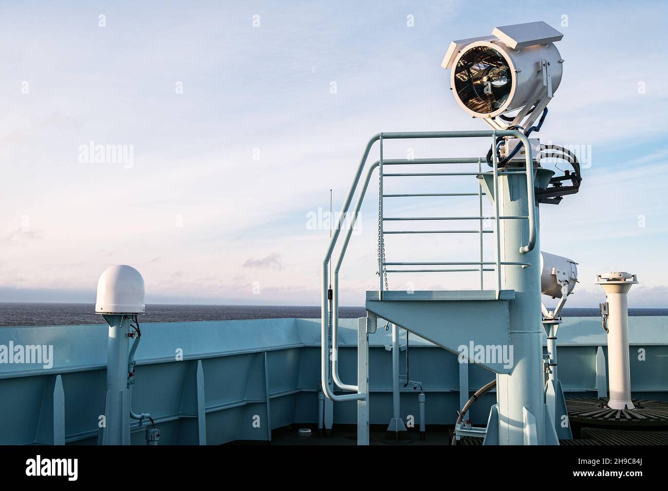 Ship's bell and signal light on the ship Stock Photo