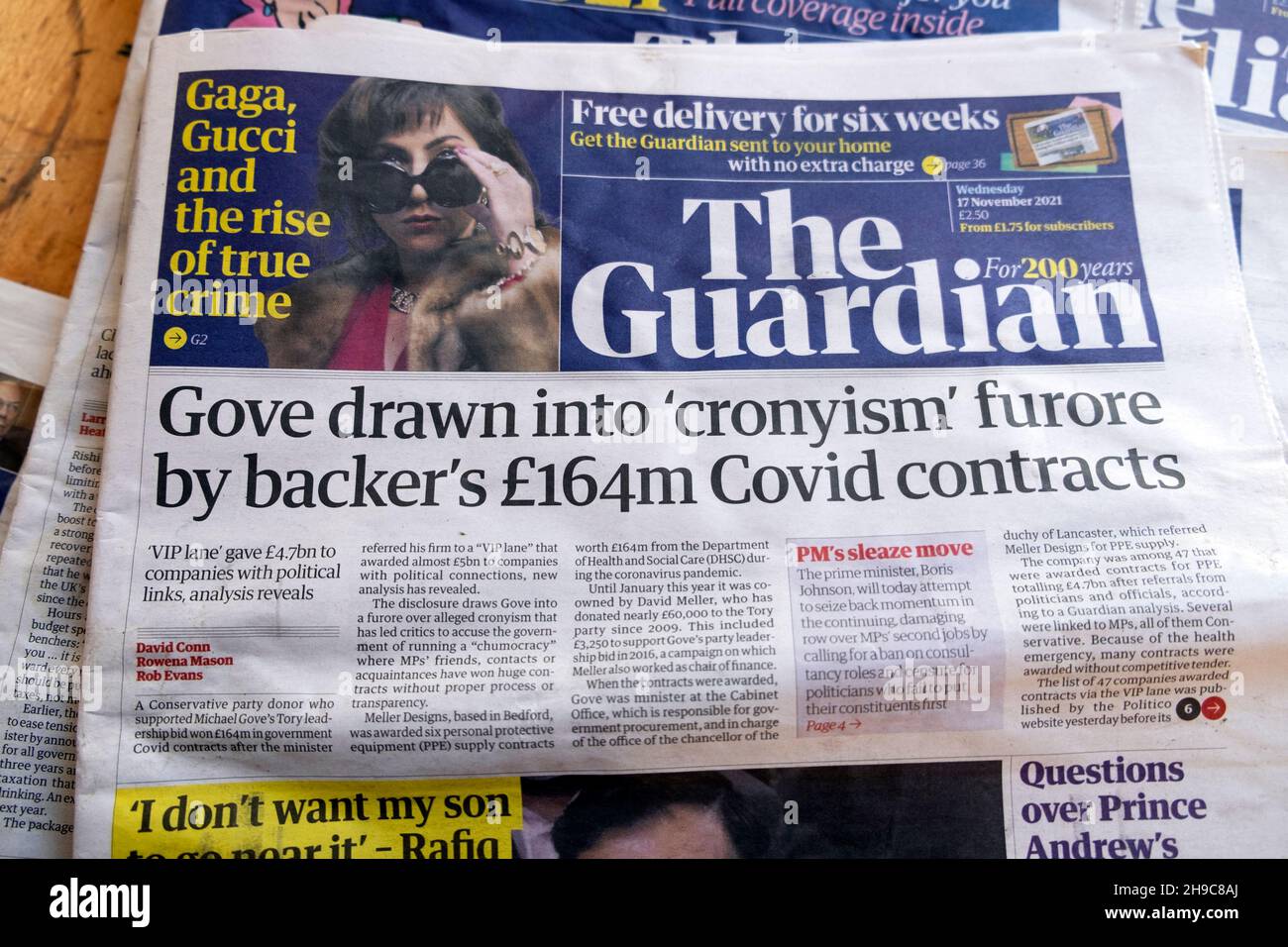 Michael 'Gove drawn into 'cronyism furore by backer's £164m Covid contracts' Guardian newspaper front page headline on 17 November 2021 in London UK Stock Photo