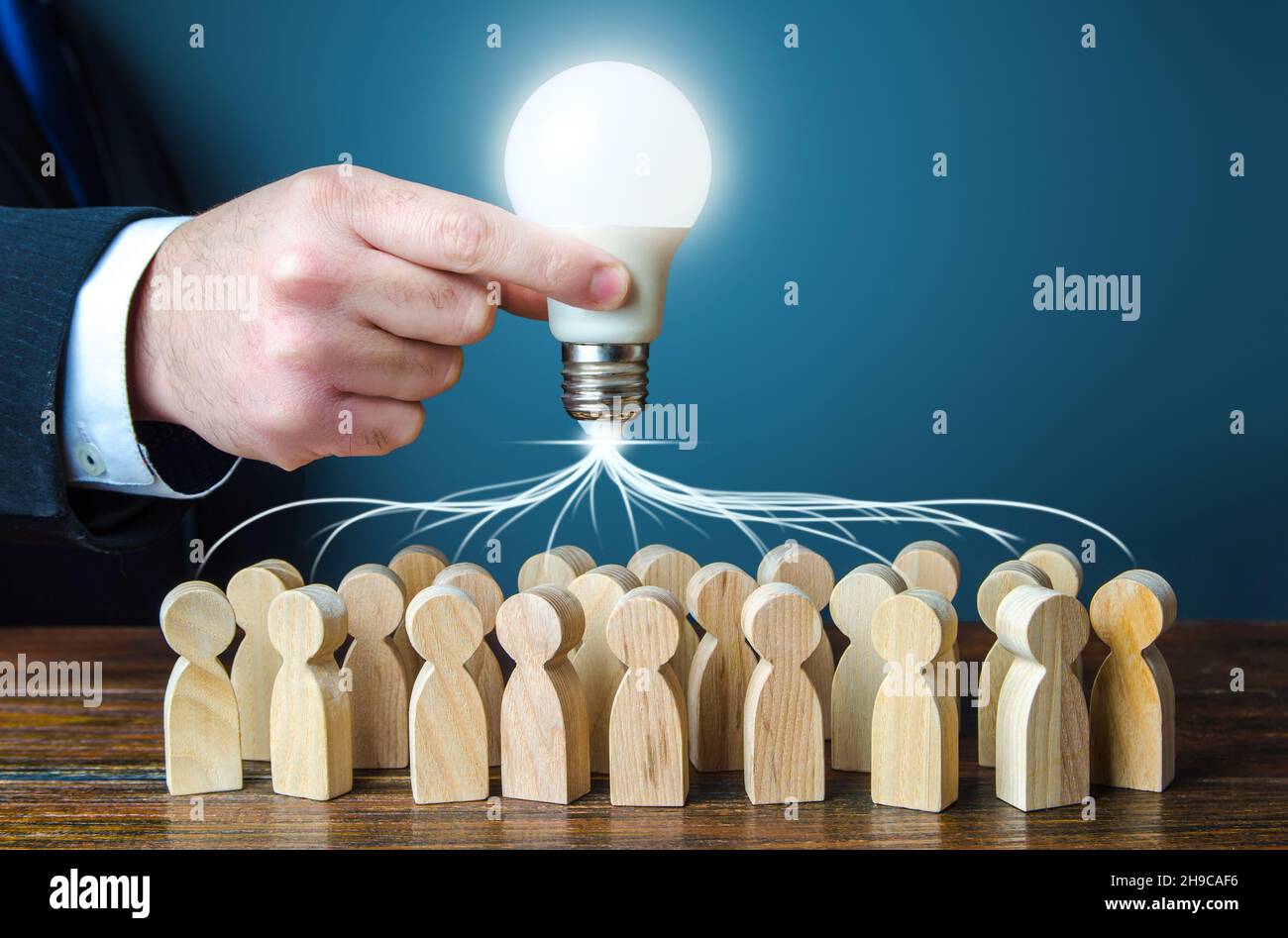 Leader concentrates team efforts on new idea. Brainstorming. Joint project. Development of innovations and technologies. Research R&D. Cooperation. Cr Stock Photo
