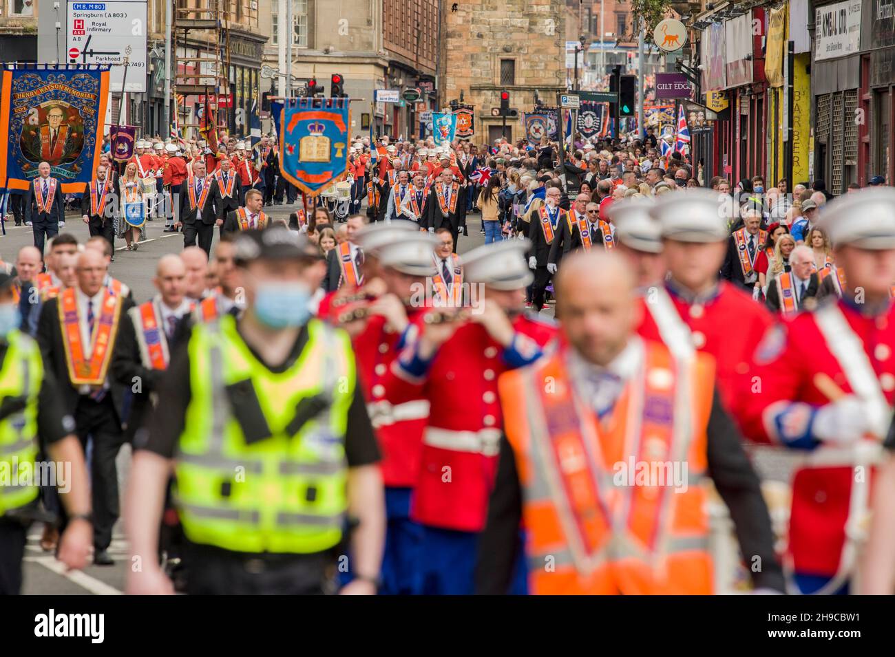 Thousands of members take part in the Orange marches, celebrating the