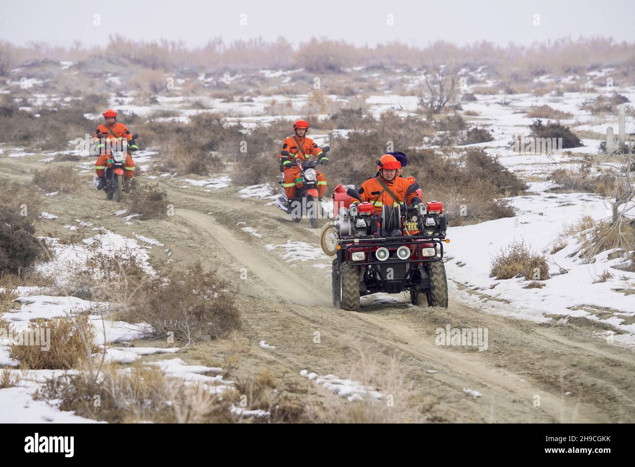 (211206) -- WUSU, Dec. 6, 2021 (Xinhua) -- Staff members patrol the Ganjia Lake forest region in Wusu City of northwest China's Xinjiang Uygur Autonomous Region, Dec. 4, 2021. As winter approaches, authorities have been paying more attention to forest fire prevention in the Ganjia Lake forest region in the west of Junggar Basin. Forest rangers have also stepped up their patrolling efforts. In the Ganjia Lake forest region, there are 18 forest management and protection stations that are responsible for forest fireproofing, management of forest resources and grassland and wild animal protect Stock Photo