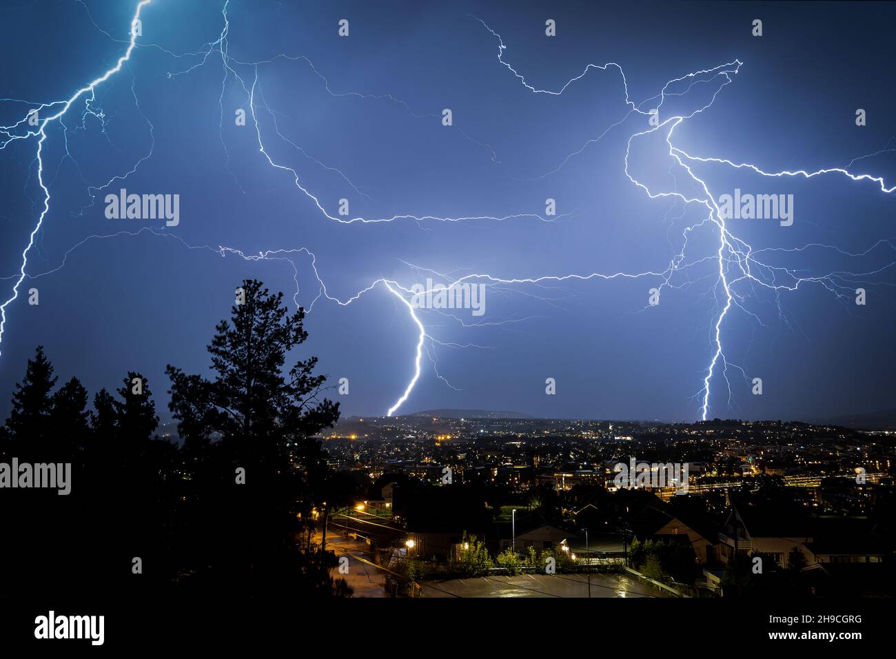 Lightning in the sky over the city Stock Photo - Alamy