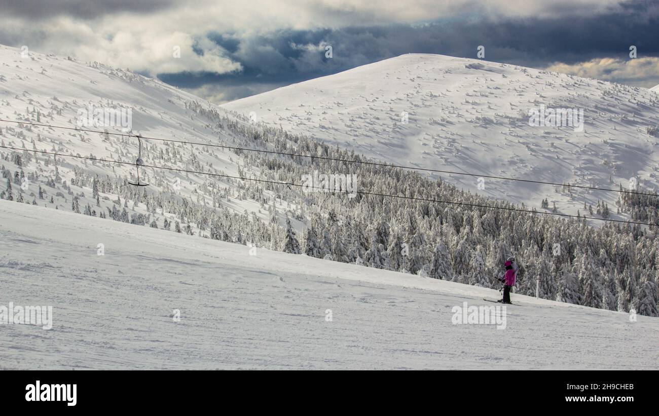 Person in snowy mountains hi-res stock photography and images - Alamy