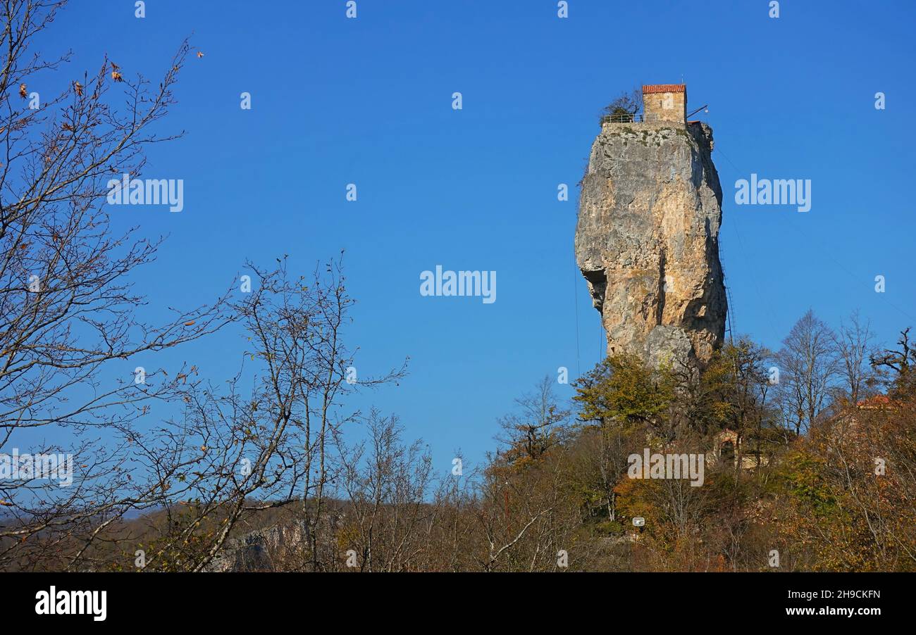 Katskhi pillar: The extraordinary church where daring monks climb closer to God - Winter with bluesky Stock Photo