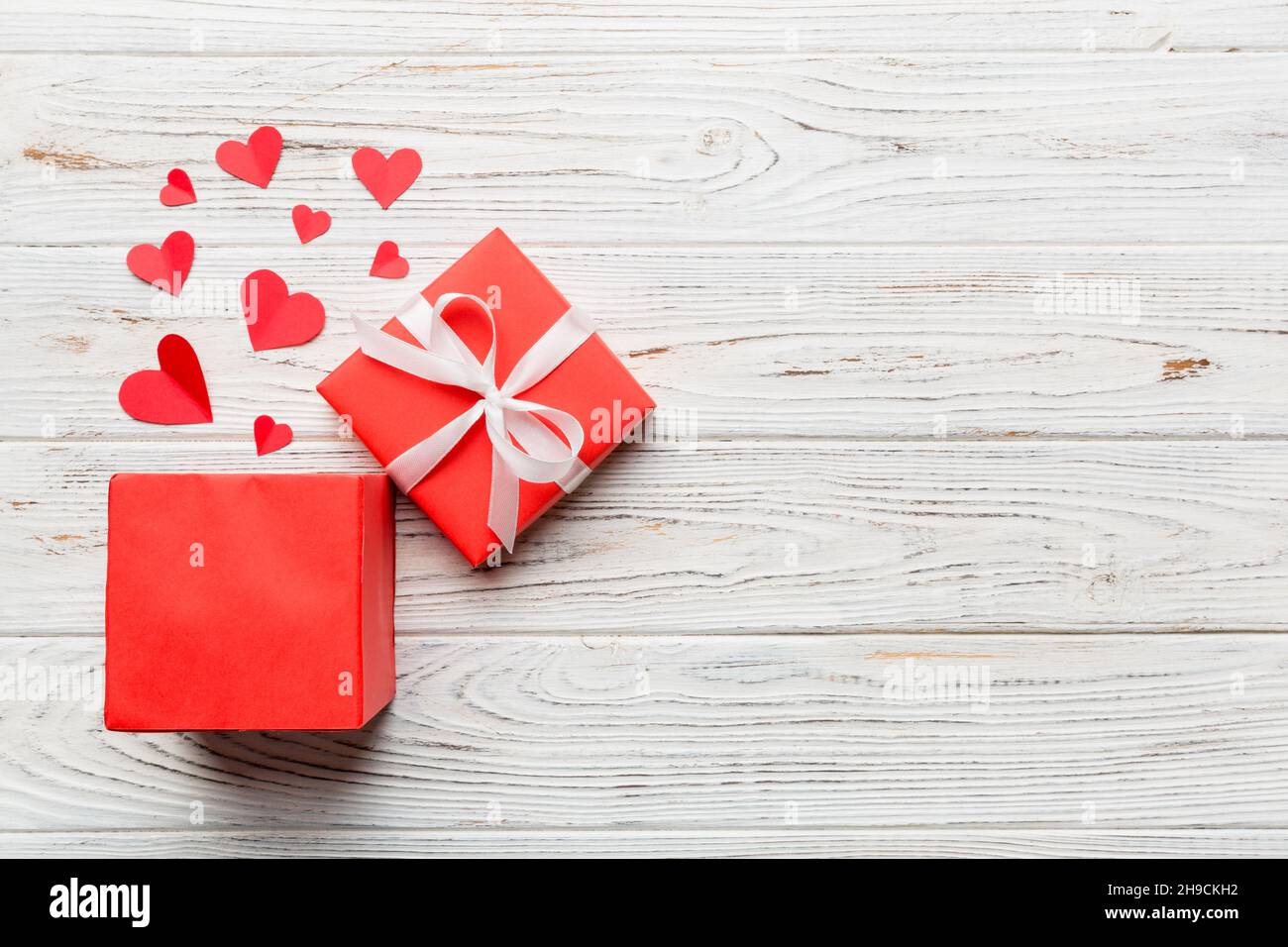 Happy valentines day opened heart shape gift box with small hearts, on ...
